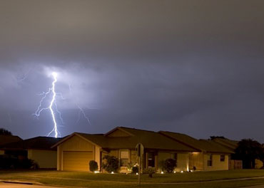 lightning bolt behind house